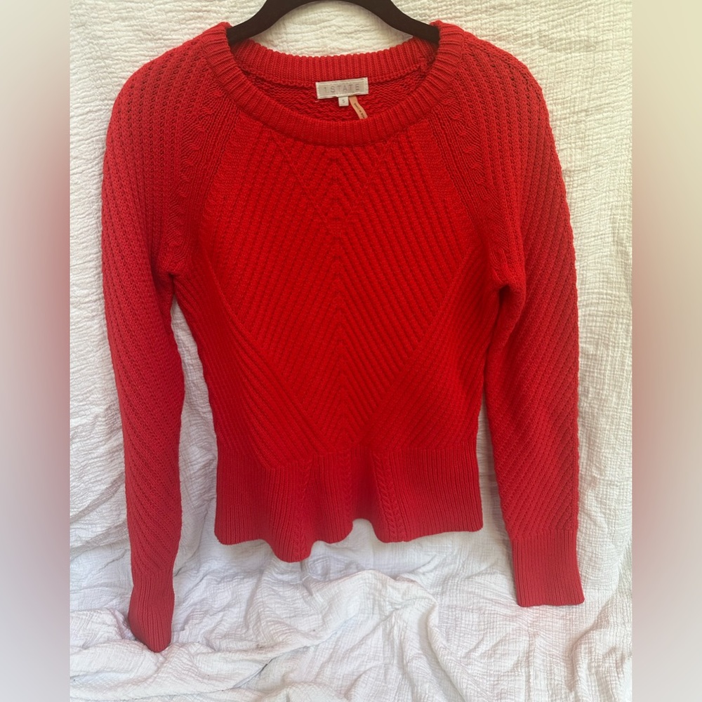 Size small perfect red sweater with fun pattern details, worn once
